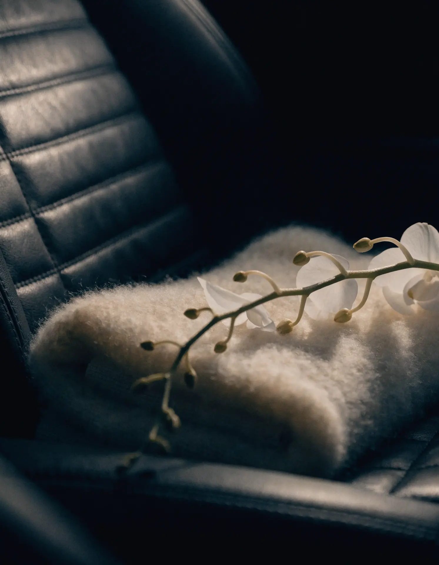 Quiet leather cabin of a chauffeured sedan after a JFK arrival