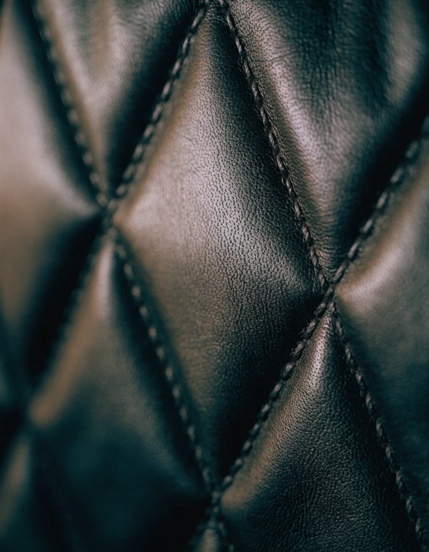 Quilted leather seat detail inside a Famous Drive chauffeured sedan